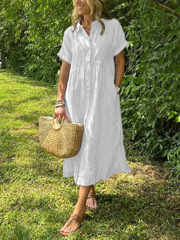 Long flowing casual maxi dress for women, featuring short sleeves. Elegant yet comfortable for summer adventures.