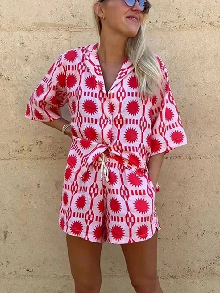Comfortable women's two-piece shirt & shorts set with a modern geometric print for effortless daily wear.