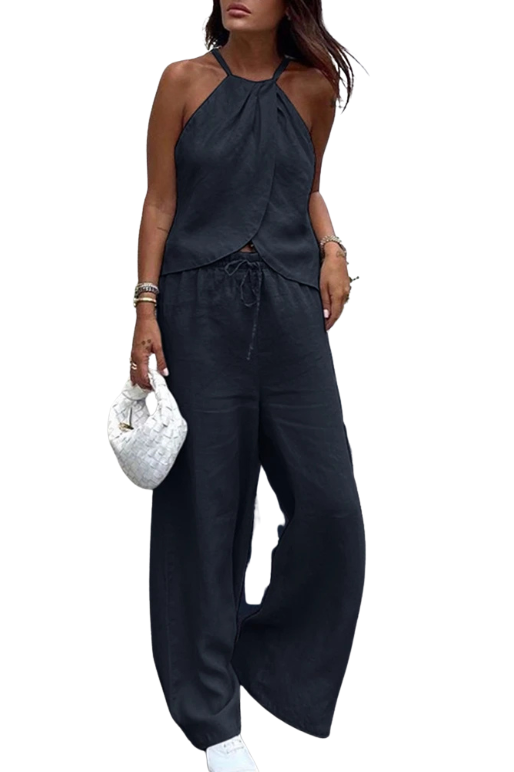 Versatile women's summer suit featuring a chic halter top and comfortable wide leg trousers. Casual or elegant.