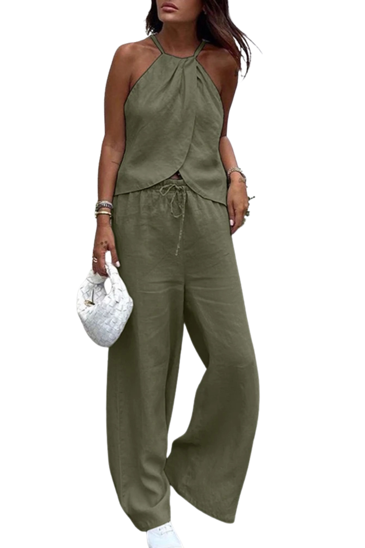 Coordinated women's summer suit with a breezy halter top and comfortable wide leg trousers, ideal for warm days.