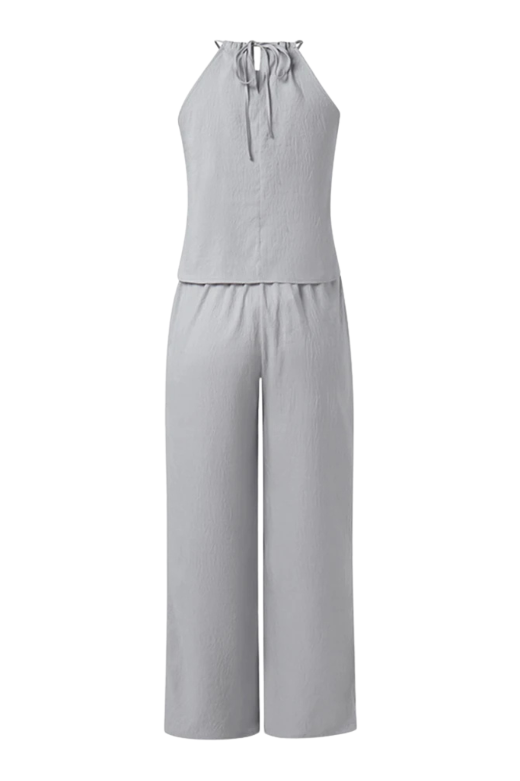 Women's two-piece summer suit: An elegant halter top and comfortable wide-leg trousers for a versatile, chic look.
