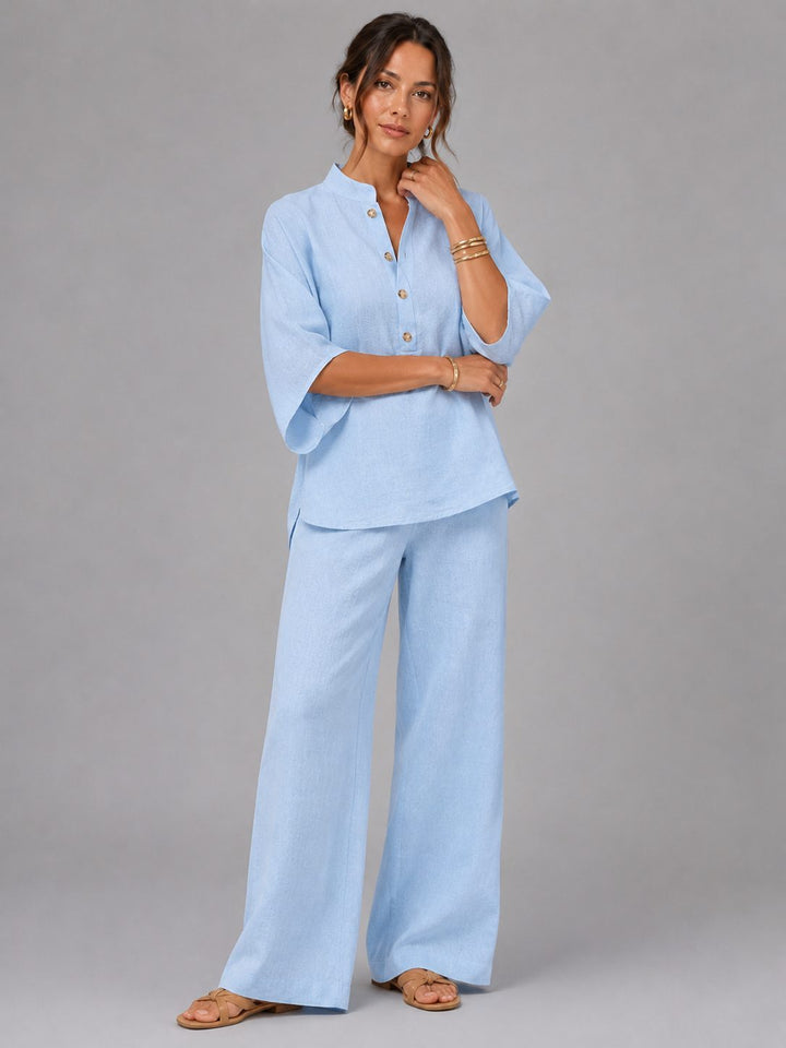 Stylish women's summer linen set featuring a relaxed top and wide-leg trousers, ideal for loungewear.