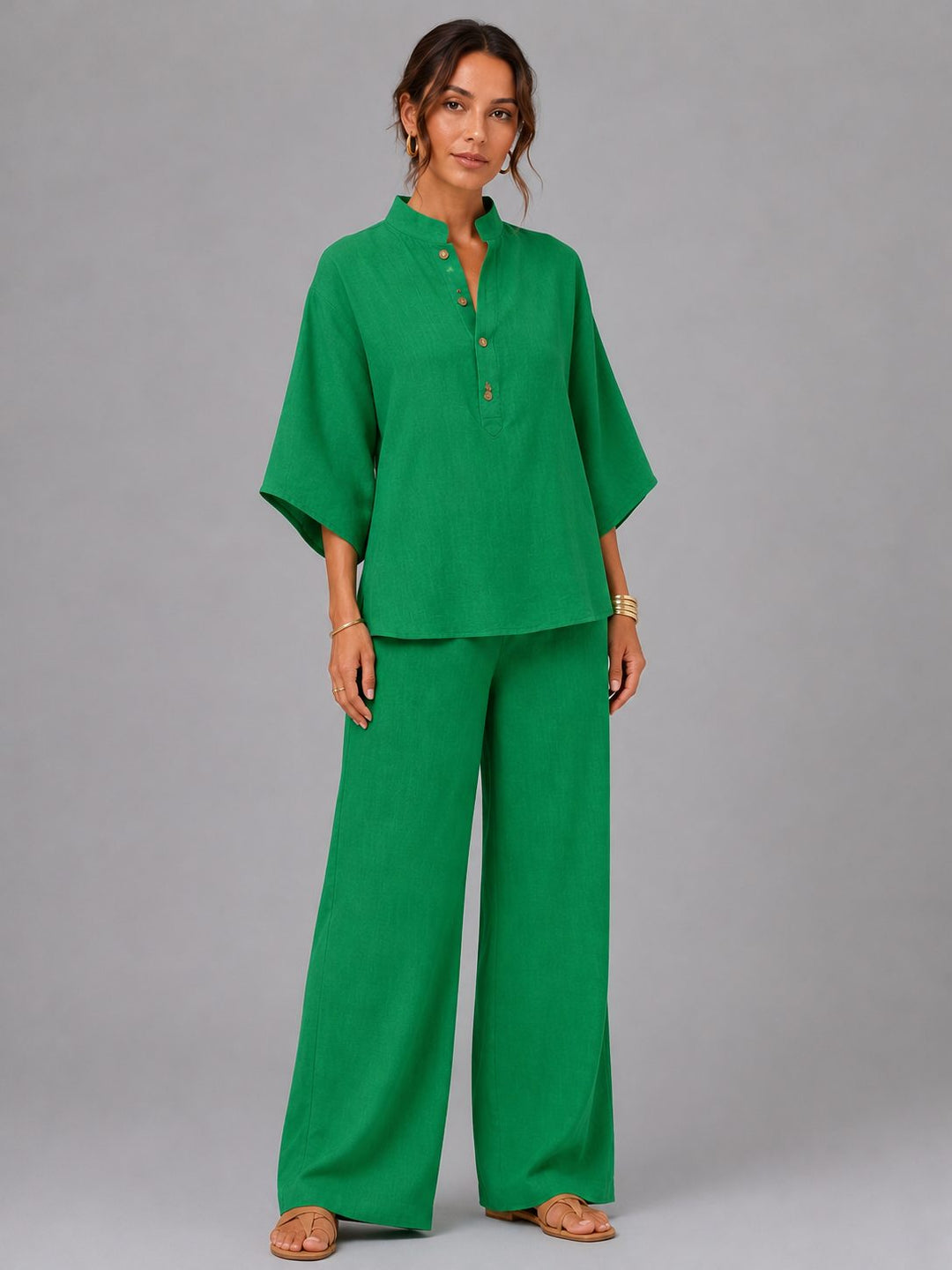 Comfy women's two-piece linen set with wide-leg pants and a casual, breathable top for warm days.
