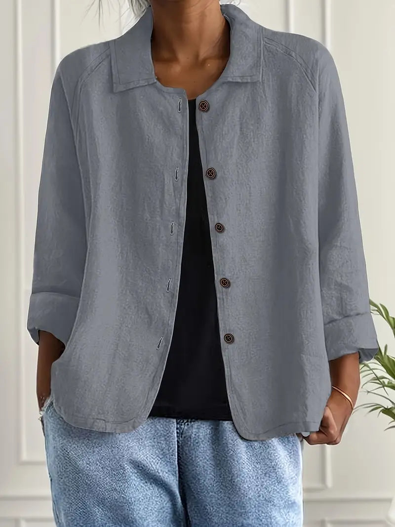 Elegant women's long sleeve button-up blouse, perfect as a fashion top for workwear or casual outfits.