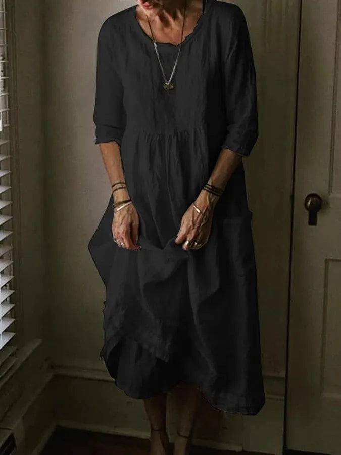 Versatile women's casual midi dress; loose fit, 3/4 sleeves & pockets for ultimate summer comfort and style.