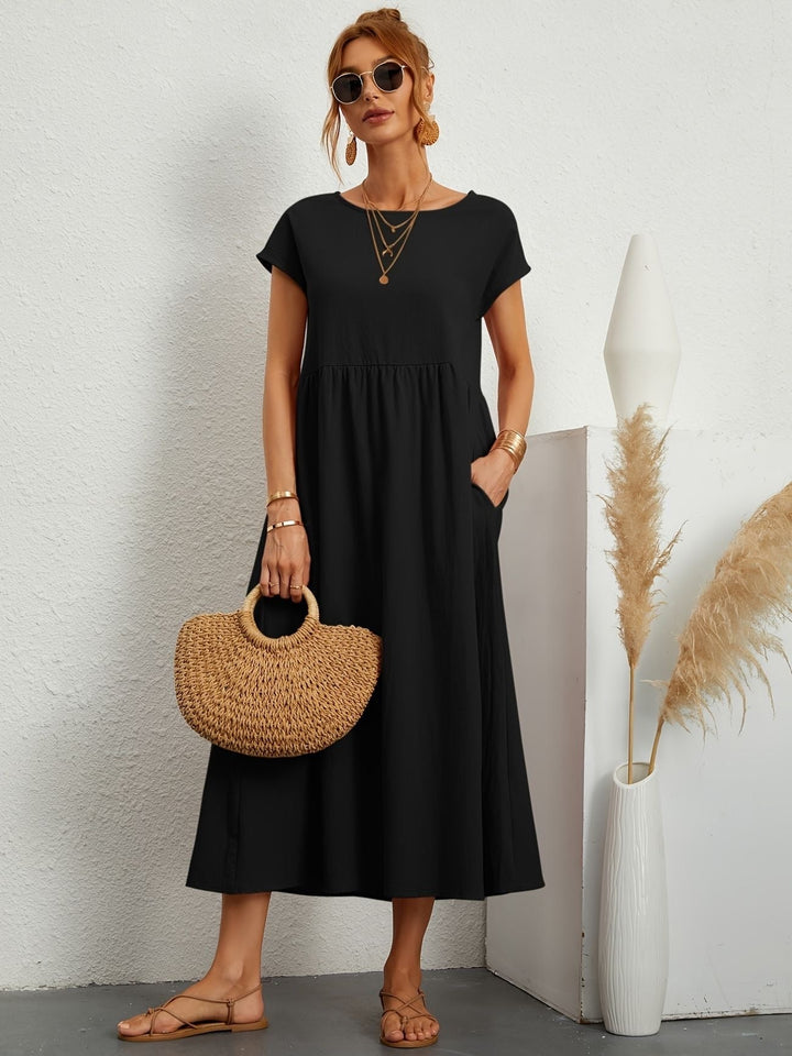 Versatile women's maxi dress, loose fit, round neck, pockets; great for casual or elegant everyday wear.