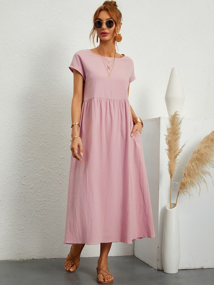 Everyday women's casual maxi dress, short sleeve, round neck, and pockets for ultimate comfort & style.