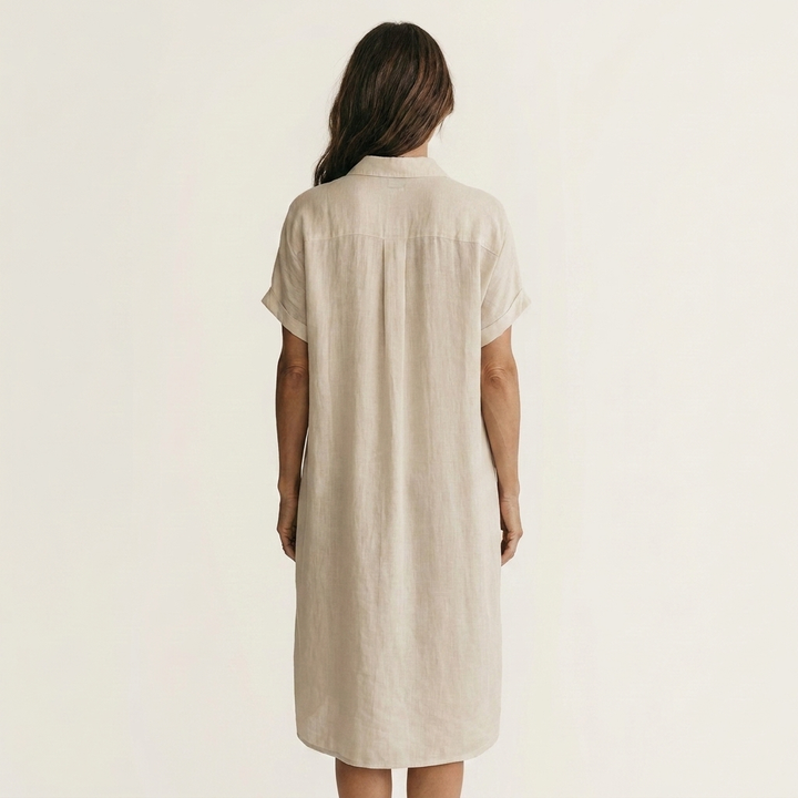 Women's versatile midi shirt dress, rolled cuffs & button-front. Effortless spring/summer fashion, casual & elegant.