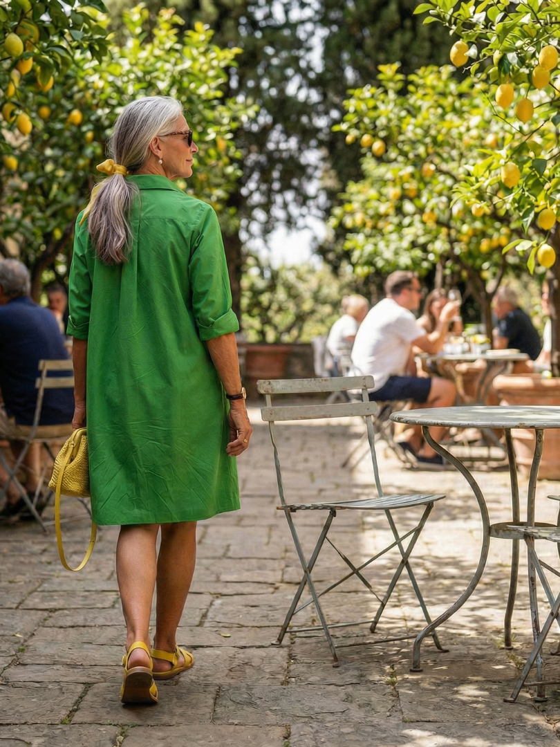 Effortless green women's casual dress for morning wear. Relaxed fit, knee-length, three-quarter sleeves & pockets.
