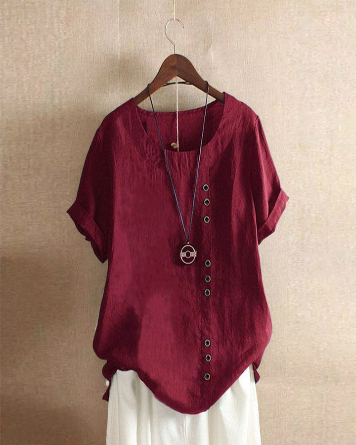 Effortless women's round neck short sleeve blouse, ideal for a modern and relaxed look.