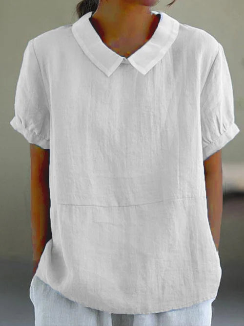 Elegant women's solid white top, lightweight and comfortable. Perfect casual summer style.
