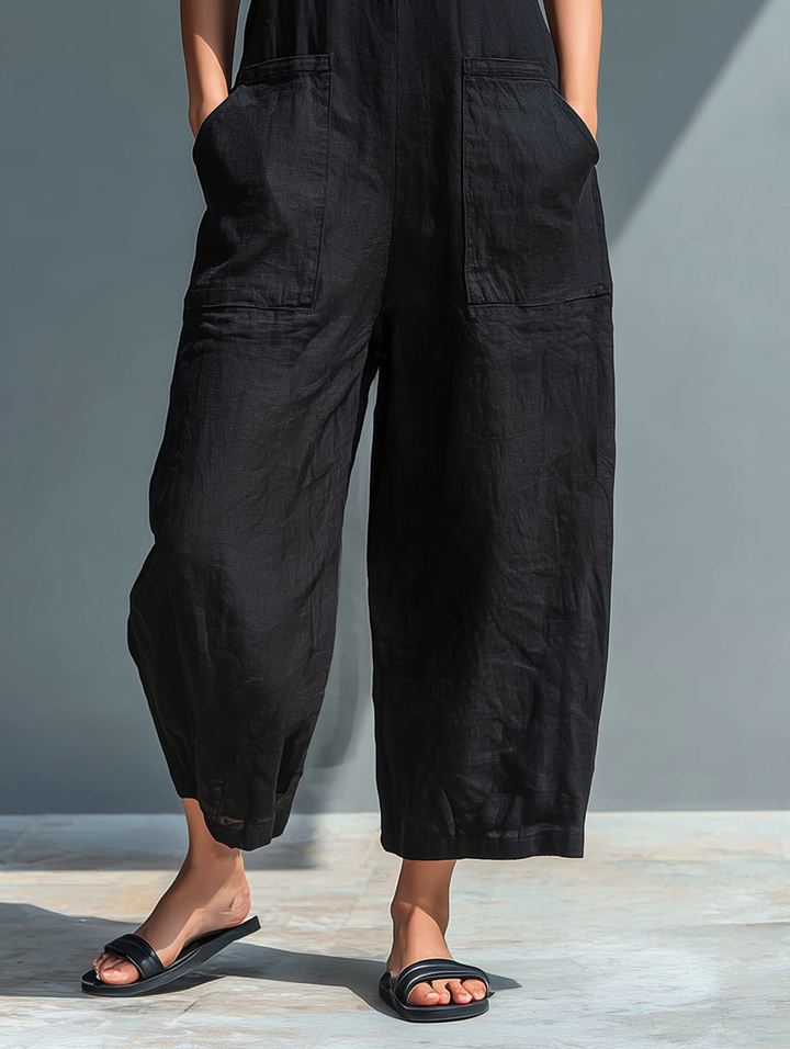 Effortless women's straight leg jumpsuit with sleeveless design and chic button front.