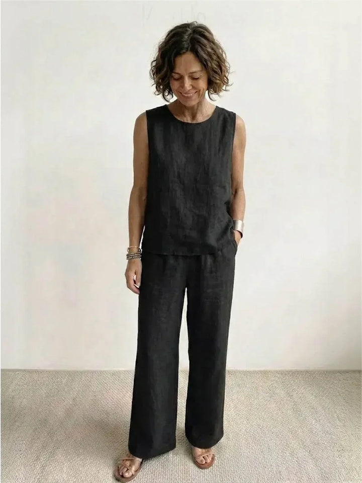 Elegant women's two-piece set, sleeveless top & wide-leg pants, perfect for spring/summer fashion and casual outings.
