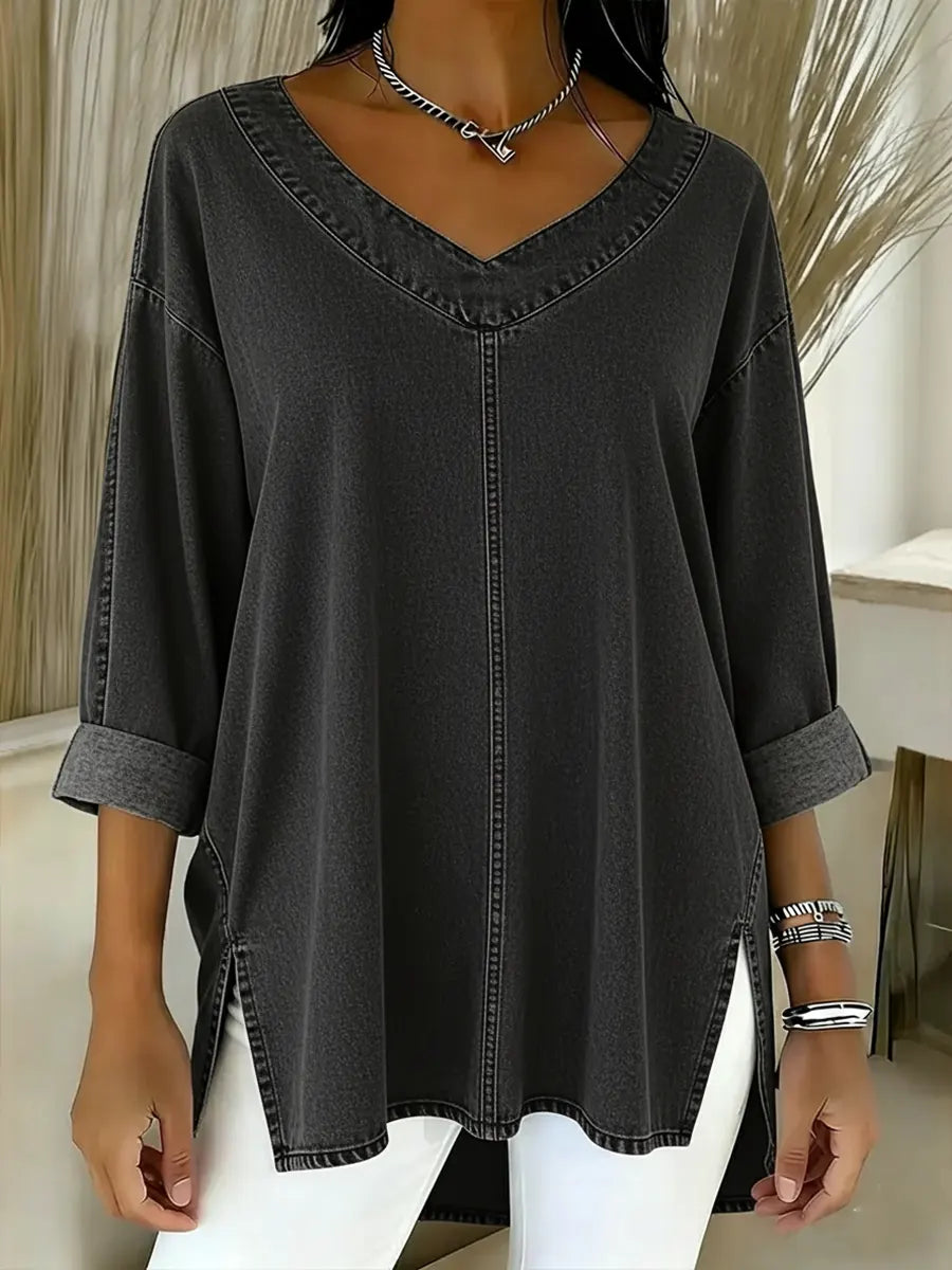 Casual women's v-neck denim shirt with long sleeves, ideal for versatile spring & autumn fashion. Relaxed everyday top.