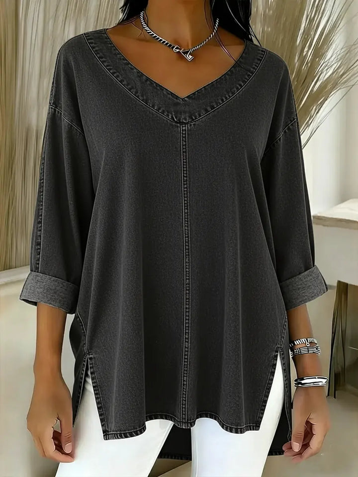 Casual women's v-neck denim shirt with long sleeves, ideal for versatile spring & autumn fashion. Relaxed everyday top.