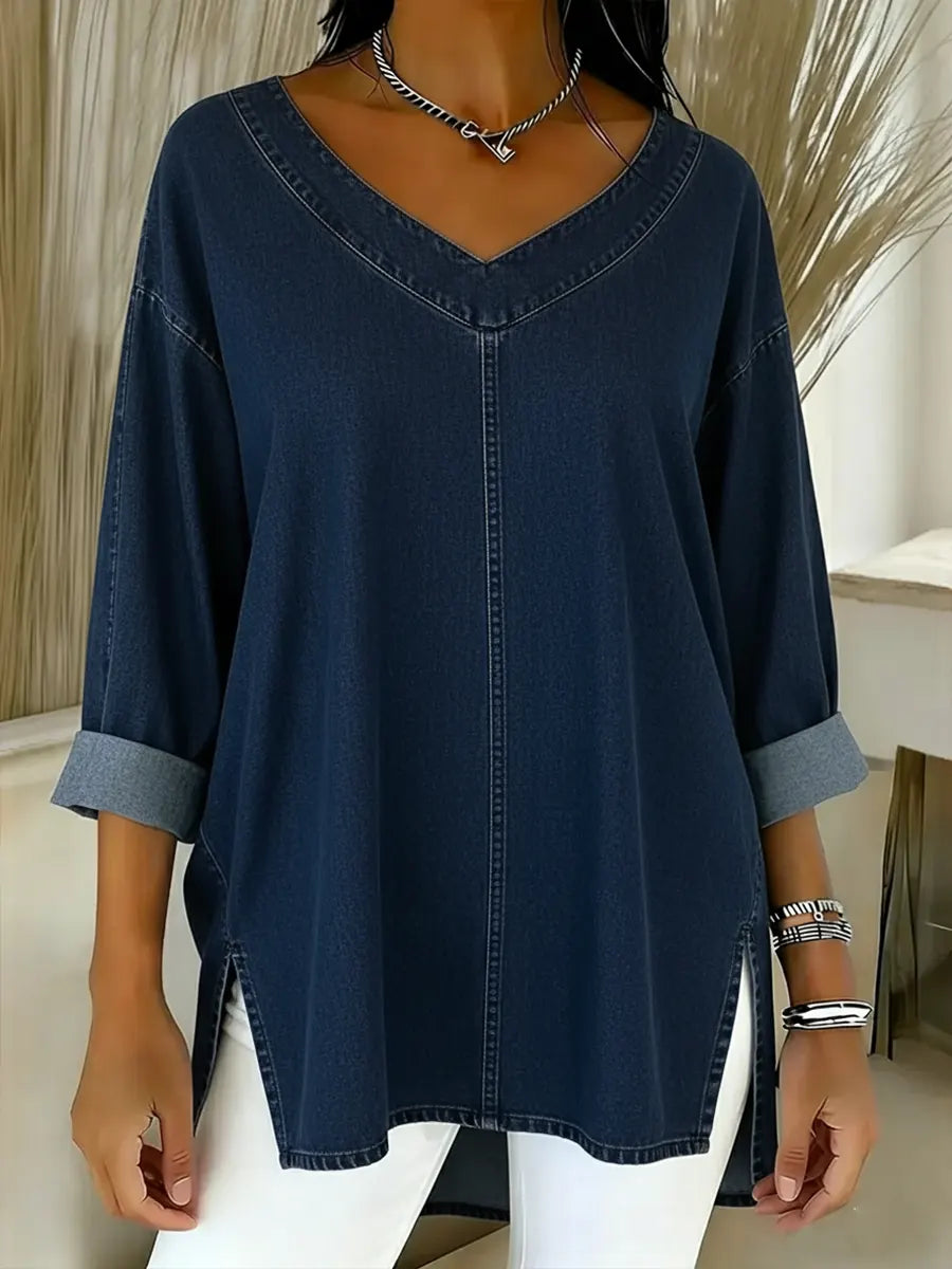 Versatile women's v-neck denim tunic shirt with long sleeves. An effortless, relaxed fit top for smart casual occasions.