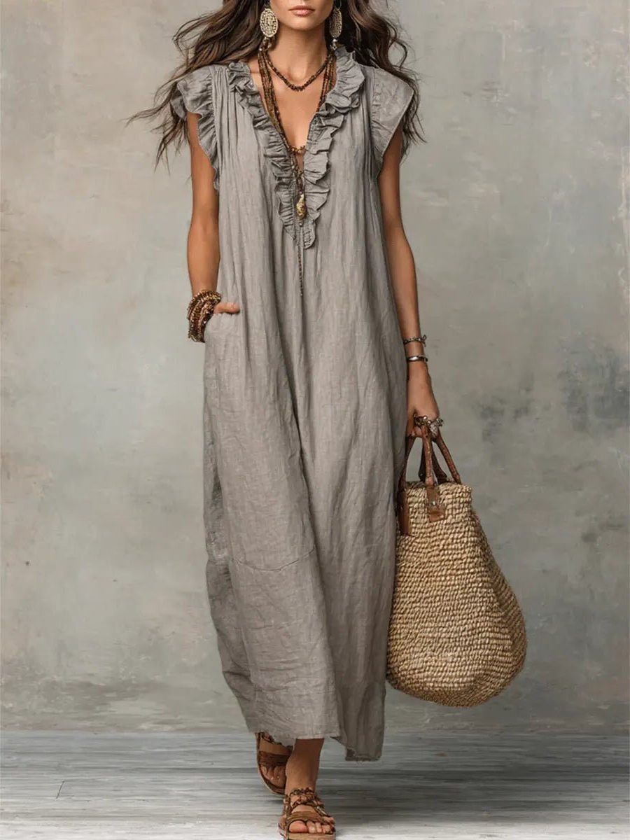 Women's effortless V-neck maxi dress with flowy flutter sleeves for a chic summer or everyday look.