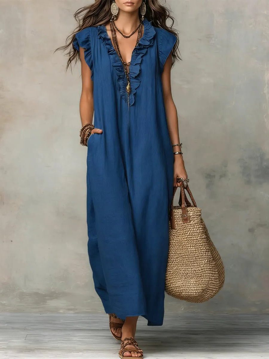 Casual women's V-neck maxi dress with elegant flutter sleeves, ideal for comfortable everyday wear.