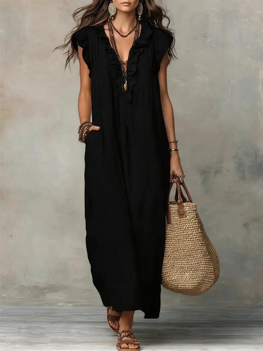 Comfortable women's flowy V-neck maxi dress with flutter sleeves, perfect for everyday casual style.