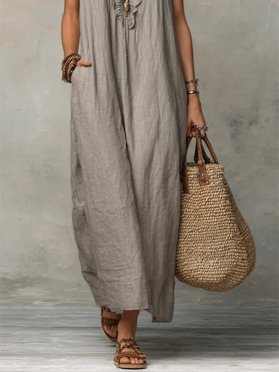 Stylish women's V-neck maxi dress with flutter sleeves, a relaxed fit summer dress for any occasion.
