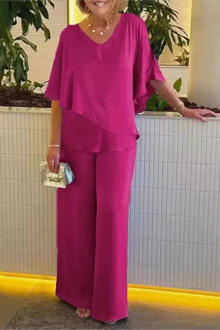 Effortless women's wide leg pants & batwing top set, combining comfort, style, and versatility.