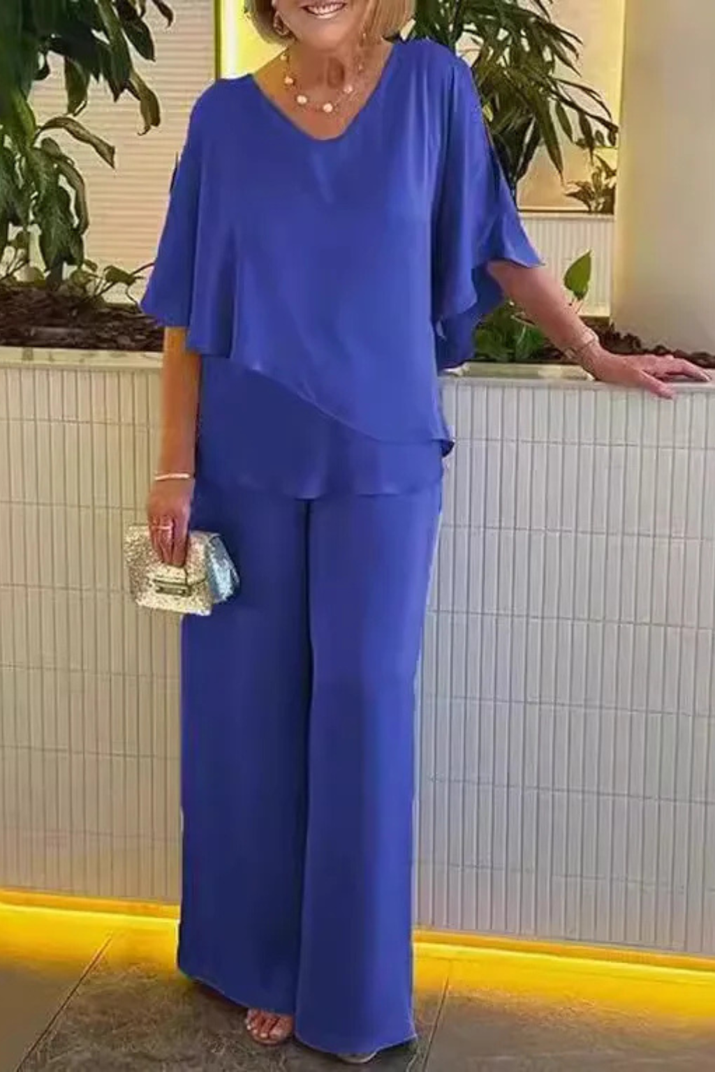 Versatile women's wide leg pants & batwing top set, a chic coordinated outfit for any event.