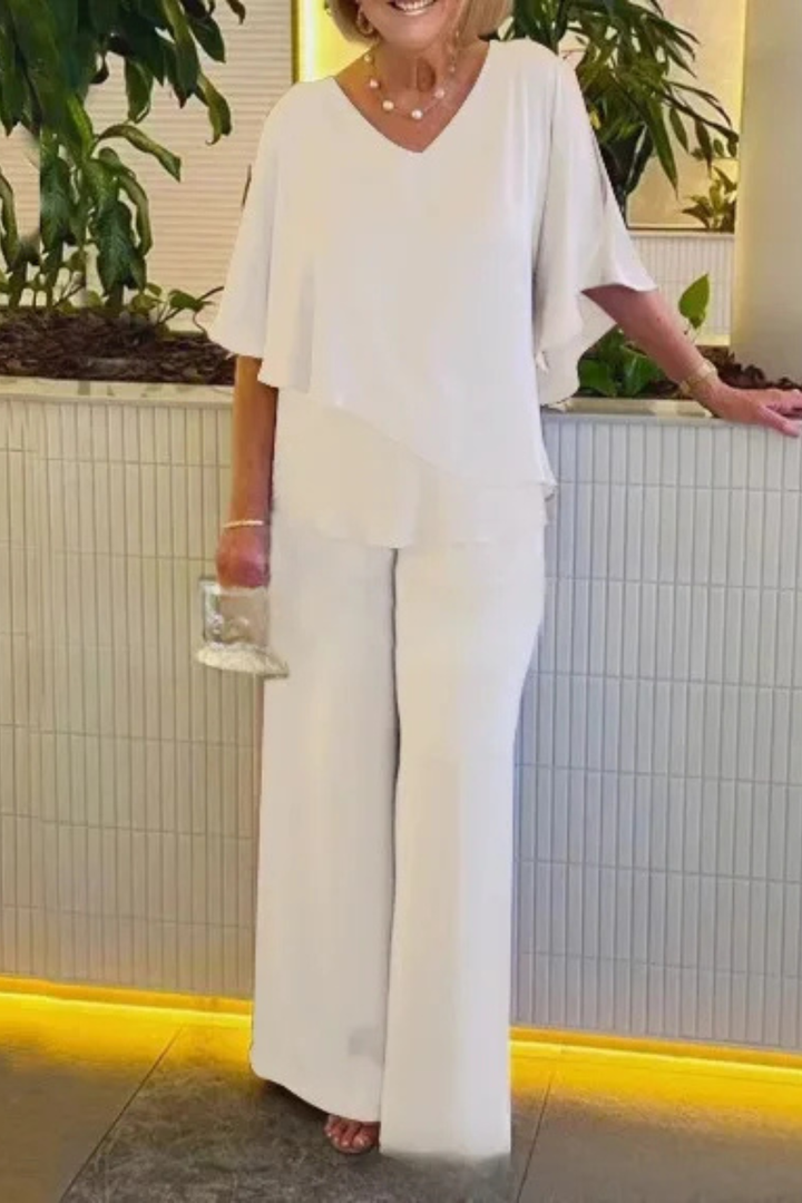 Chic women's batwing top and wide-leg pants set, offering comfort and modern style.