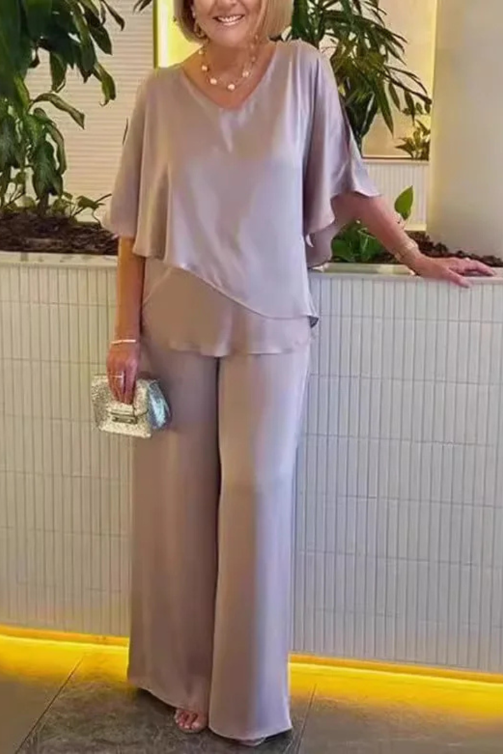 Light and airy women's wide leg pants & batwing top set, perfect for summer fashion.