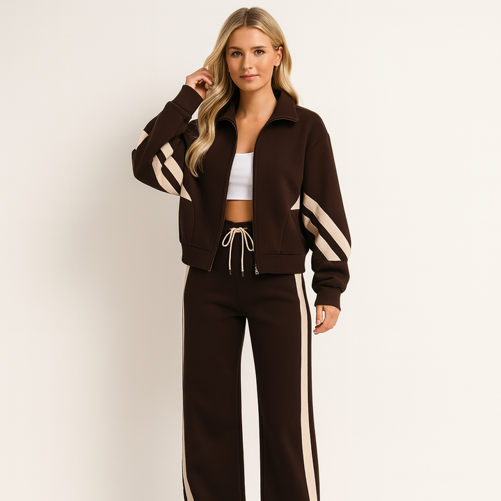 Women's effortlessly stylish wide leg tracksuit set. Includes a comfortable zip jacket & matching pants, perfect for athleisure.