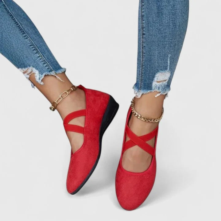 Elegant women's pointed-toe Mary Jane flats, designed with elastic cross-straps for comfortable, all-day wear.