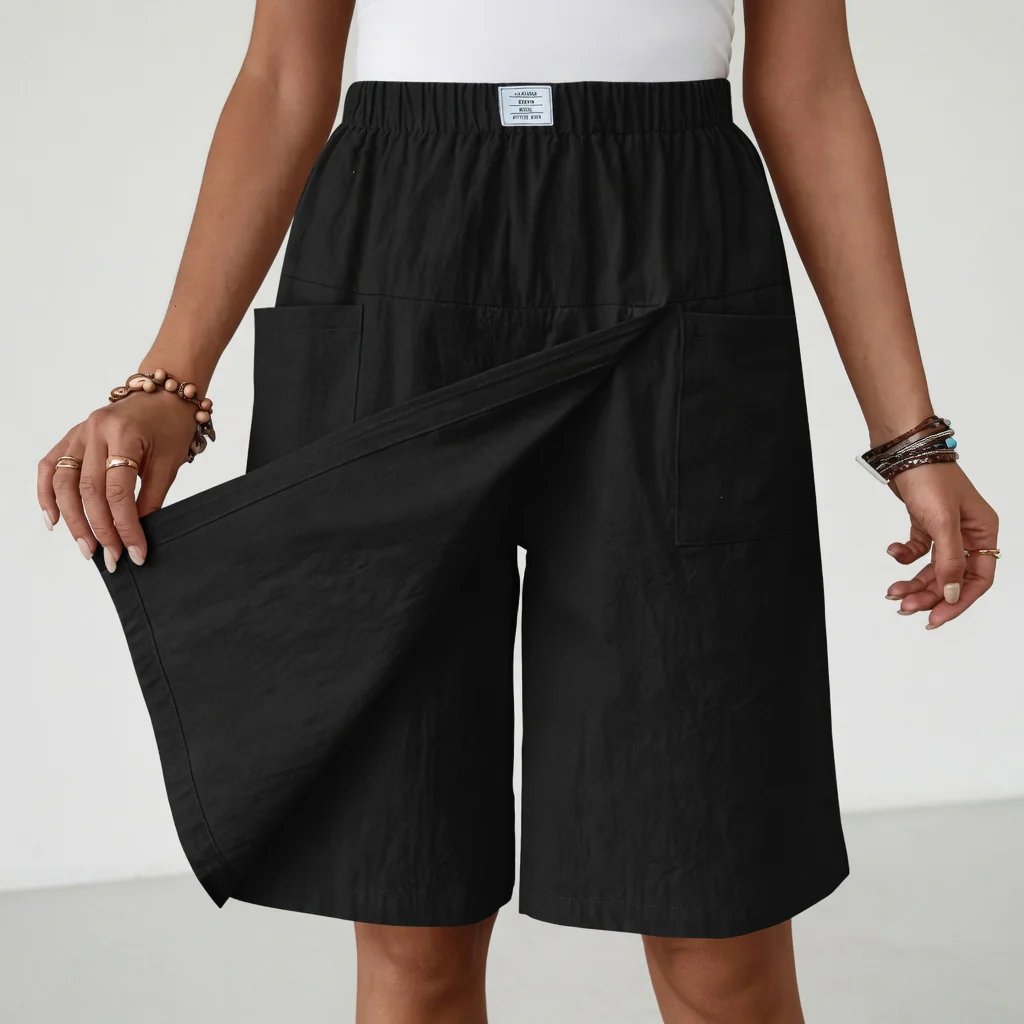 Comfortable women's athletic shorts featuring an elastic waistband & practical pockets, perfect for sports & summer.