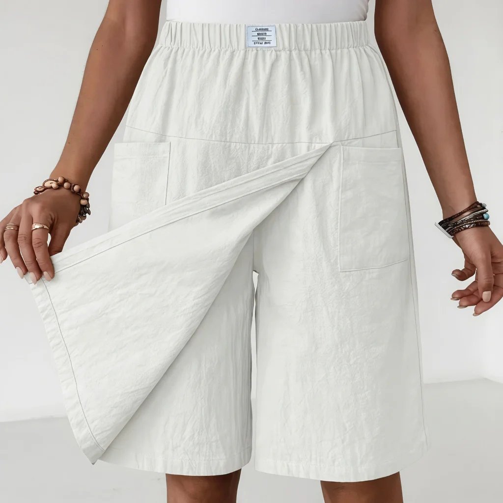Versatile women's activewear shorts with comfy elastic fit & functional pockets for keys or phone during activities.