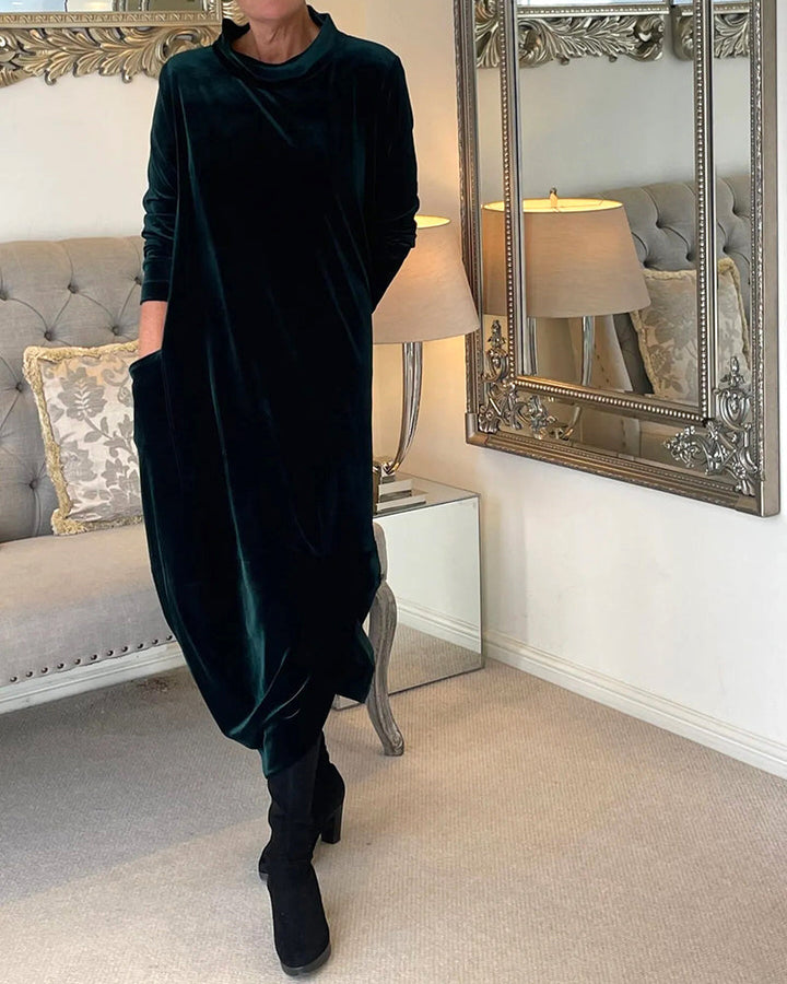 Elegant A-line dress with a graceful flow and convenient pockets, women's fashion essential.
