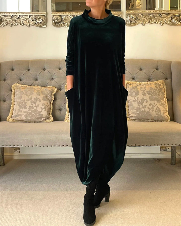 Sophisticated A-line dress for women, featuring a flattering fit and discrete pockets.