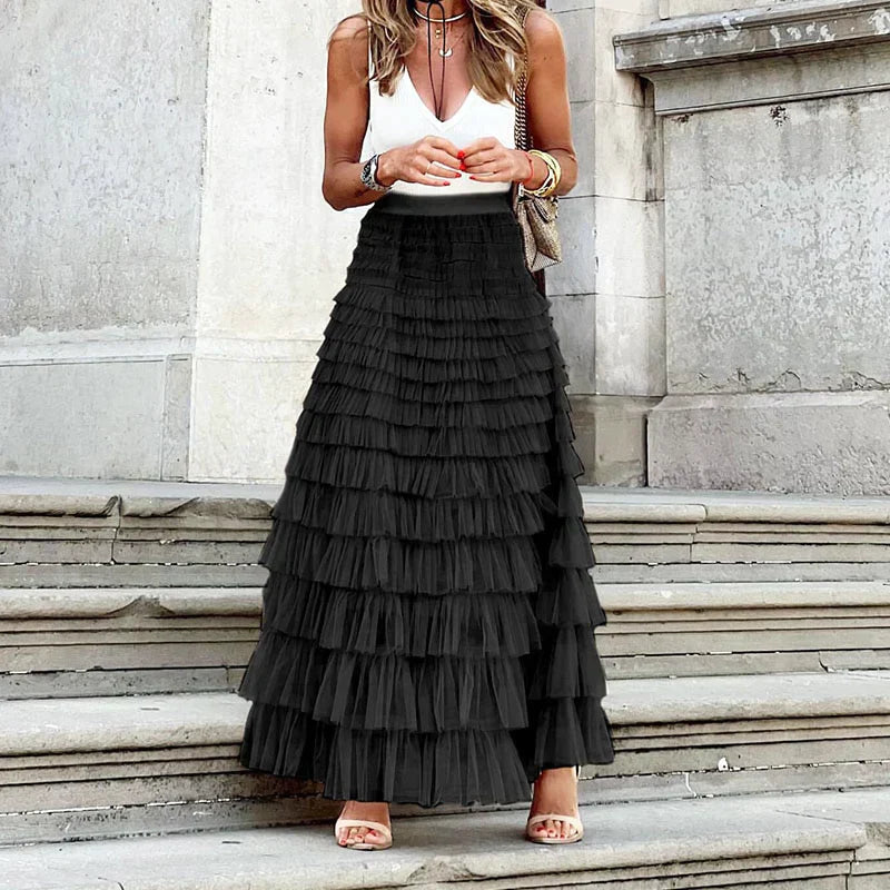 Detailed view of the elastic waist on a women's A-line maxi skirt, highlighting its comfortable and versatile fit.