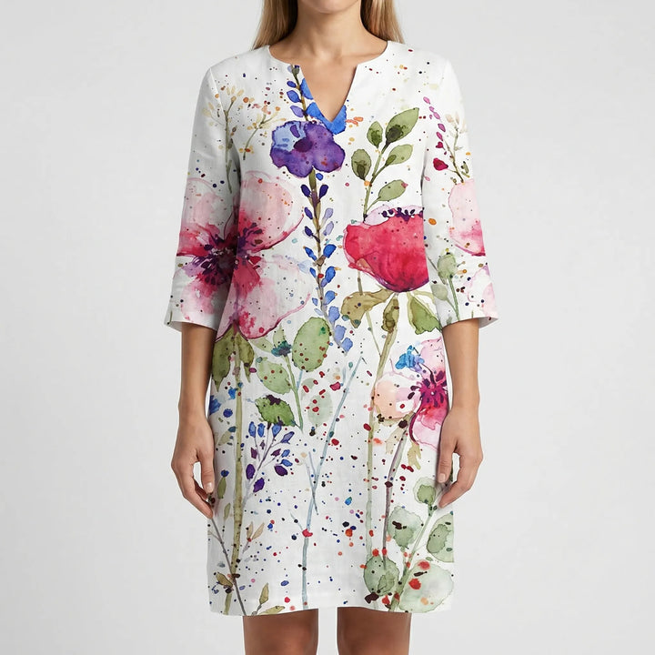 Sophisticated women's abstract floral shift dress, long sleeves. Offers comfort and versatile fashion.