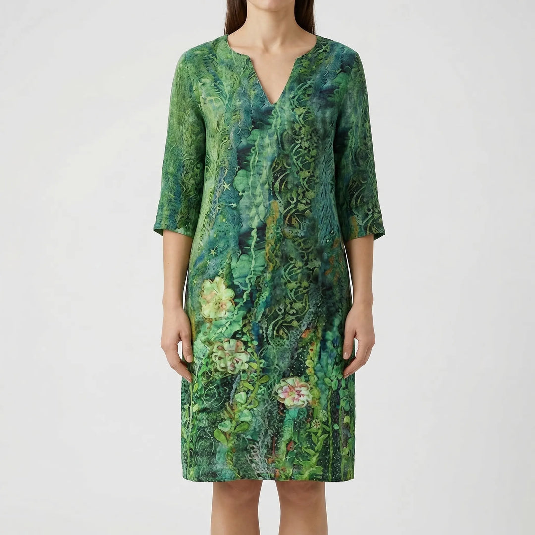 Chic abstract floral print women's long sleeve shift dress. Elegant v-neck, perfect for casual wear.