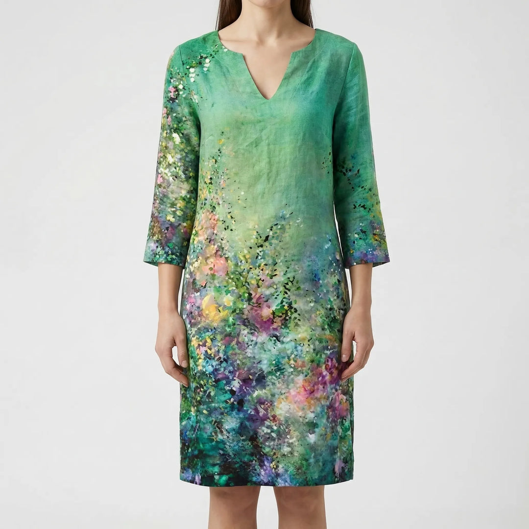 Women's long sleeve shift dress, abstract floral print, v-neck. A comfortable and versatile fashion choice.