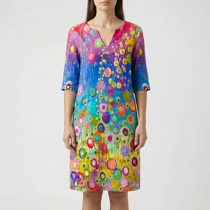 Comfortable women's long sleeve shift dress, v-neck, abstract floral pattern. Great for daytime.