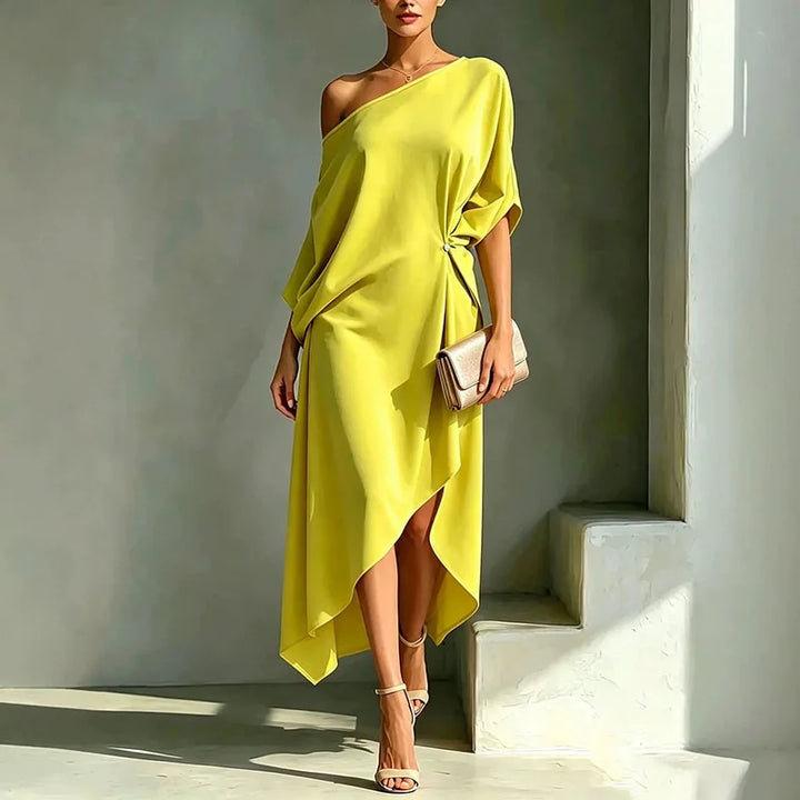Women's elegant asymmetric draped long dress in a loose, flowy fit, perfect for versatile casual or occasion wear.