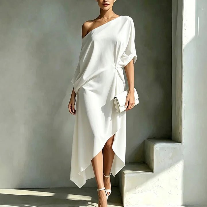 Draped women's long dress with an asymmetric design and loose fit, providing comfortable, elegant, and versatile style.