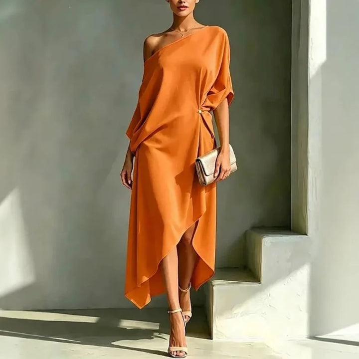 Elegant women's long asymmetric draped dress, a loose and versatile outfit for various casual or special occasions.