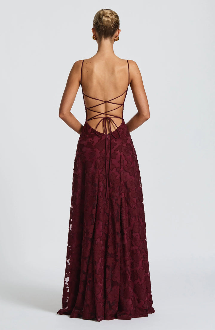 Flowing silhouette of a summer maxi dress with spaghetti straps