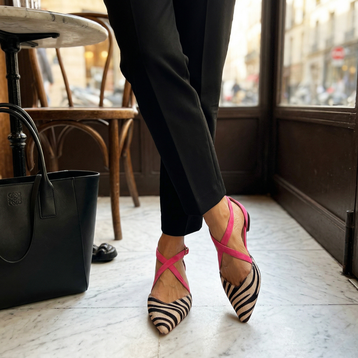 Classic women's ballet flats, designed for comfort with secure straps, a timeless everyday shoe.