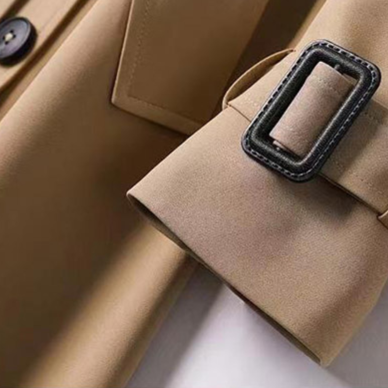 Sophisticated women's trench coat, classic belted design for an elegant & versatile long jacket.