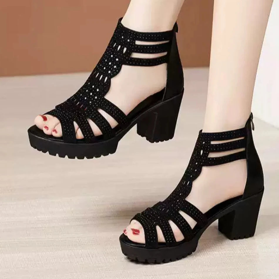 Women's elegant black heel sandals, offering stylish comfort for evening wear and formal events.