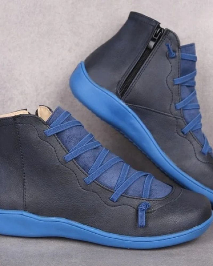 Close-up of soft leather texture on comfortable women's fashion boots.