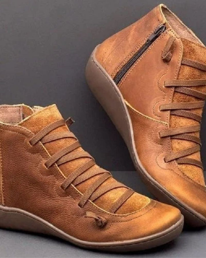 Side view of versatile women's leather boots, perfect wardrobe essential.