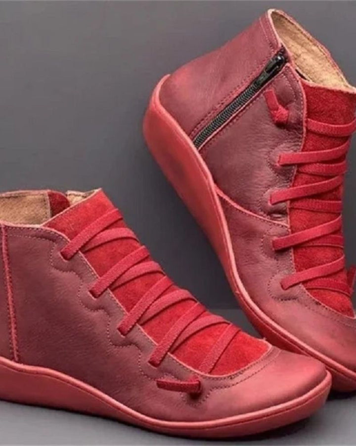 Chic women's leather boots designed for fashion and all-day comfort.