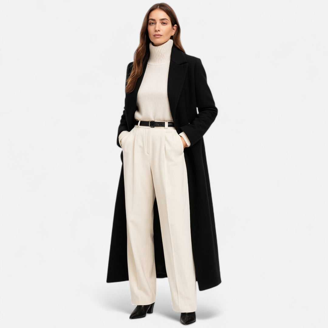 Women's elegant black longline coat with tailored fit, notch lapel, and button front. Perfect for sophisticated winter style.